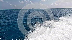 Waves from a moving speedboat in Maldives