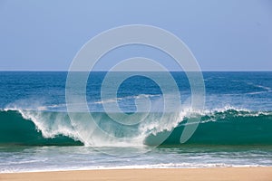 Waves over beach on Lumahai