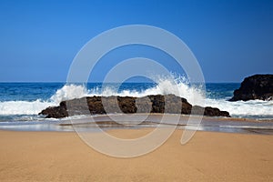 Waves over rocks on Lumahai