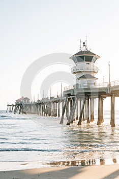 Waves in the Pacific Ocean and the pier in Huntington Beach, Orange County, California