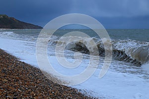 Waves on a pebble beach