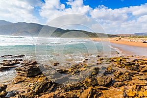 Waves in Porto Ferro beach shore