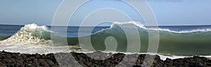 Waves pounding on basalt rocks at Ocean Beach Bunbury Western Australia