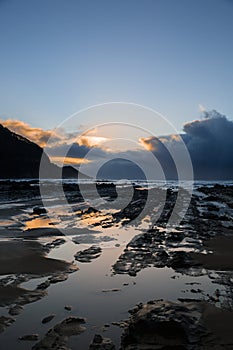 Waves and Rocks at Beach at Sunrise