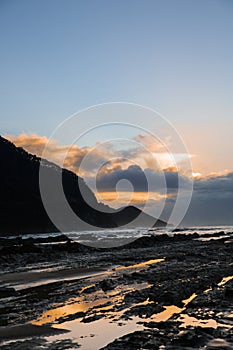 Waves and Rocks at Beach at Sunrise