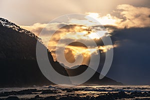 Waves and Rocks at Beach at Sunrise