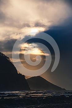 Waves and Rocks at Beach at Sunrise