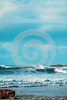 Waves and Rocks at Beach at Sunrise