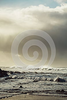 Waves and Rocks at Beach at Sunrise