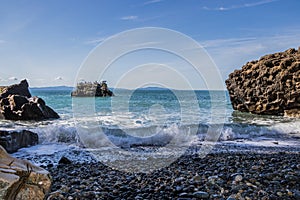 Waves on the rocky coast at Sombrio Beach photo