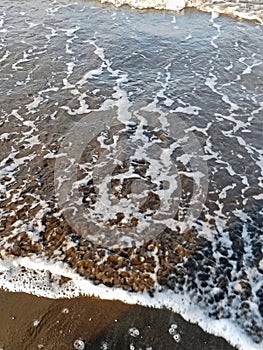 Waves on the sand beach