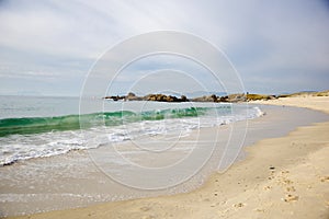 Waves on sandy beach Samil in Vigo, Vigo, Galicia, Spain