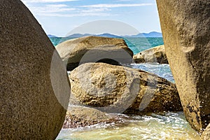 Waves of the sea hitting the big rocks