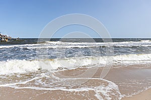 The waves in the seaside resort of Zinnowitz on the island of Usedom surround the great pier