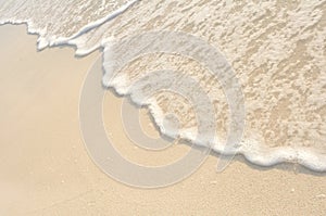 Waves on Shore of White Sand Beach