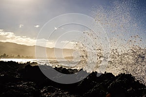 Waves splashing on rocks near Haleiwa - North shore Oahu