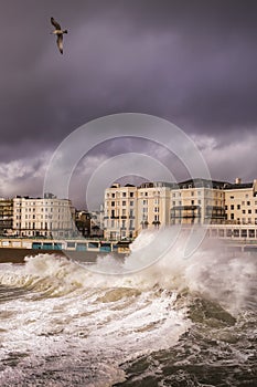 Waves and a storm blowing into Brighton