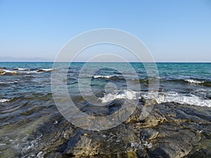 waves at sunset and rocks