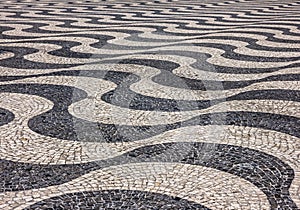 Waves of tiled floor in Portuguese traditional style, Rossio square, Lisbon