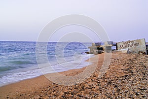 The waves washed ashore with brown sand