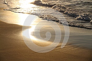 Waves washing onto Corsican beach