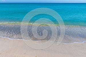 Waves Washing Over The White Sand of Coquina Beach