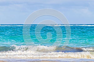 Waves water caribbean coast and beach panorama view Tulum Mexico
