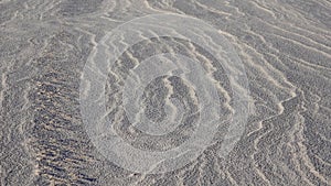 Waves on the white sand of gypsum in the White Sands National Monument in New Mexico, USA