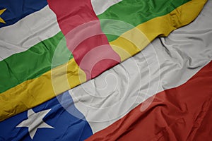 waving colorful flag of chile and national flag of central african republic