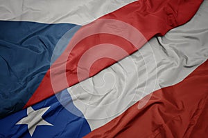 waving colorful flag of chile and national flag of czech republic