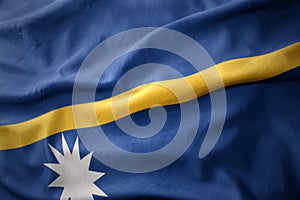 Waving colorful flag of Nauru.