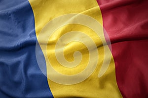 Waving colorful flag of romania.