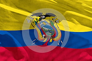 Waving Ecuador flag for using as texture or background, the flag is fluttering on the wind