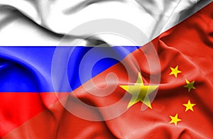 Waving flag of China and Russia