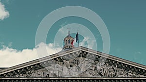 Waving the flag of France in the capital Paris on the flagpole of the Pantheon building. Slow motion, The day, against