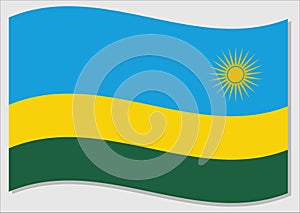 Waving flag of Rwanda vector graphic. Waving Rwandese flag illustration. Rwanda country flag wavin in the wind is a symbol of photo