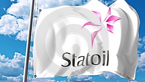 Waving flag with Statoil logo against clouds and sky. Editorial 3D rendering