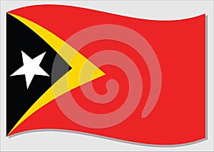 Waving flag of Timor Leste vector graphic. Waving East Timorese flag illustration. Timor Leste country flag wavin in the wind is a