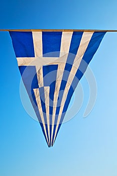waving greece flag in flagpole