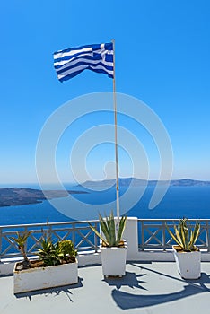 Waving Greek Flag in Santorini