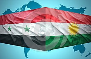 Waving Kurdish and Syrian flags