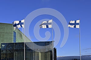 waving national flags of Finland