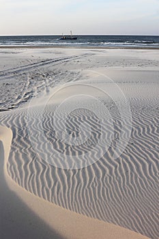Waving sand dunes at Ameland Beach, Holland photo