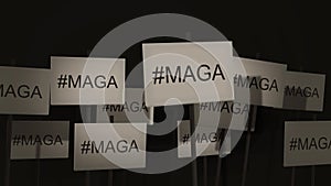 Waving signs of protest or awareness series - #MAGA - Make America Great Again