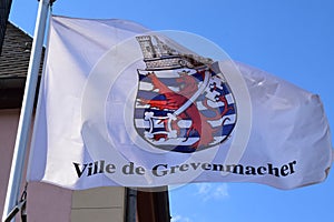 waving town flag of Grevenmacher