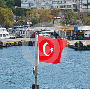 Waving Turkish flag on the ferry