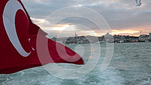 Waving Turkish Flag from a ferry in Istanbul.