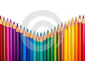 A Wavy Arrangement of Colorful Wooden Pencils on White Background. Sharpened Pencils in Wavy Style