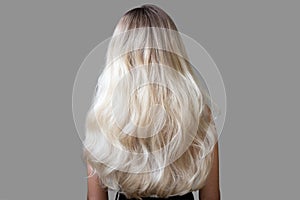wavy blond hair back view