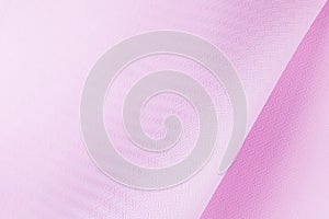 Wavy pink color background made from mat for yoga or sports.